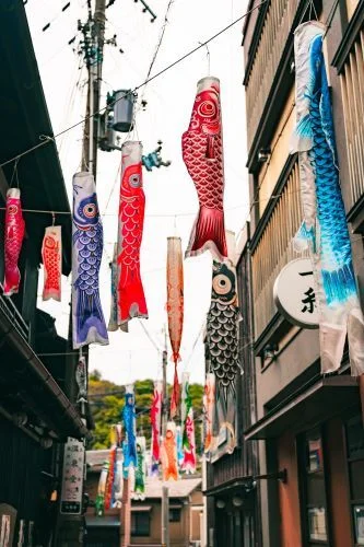 Koi Fish Flags: History, Meaning, and How to Use Them Today 12 Traditional single koinobori flag on a pole